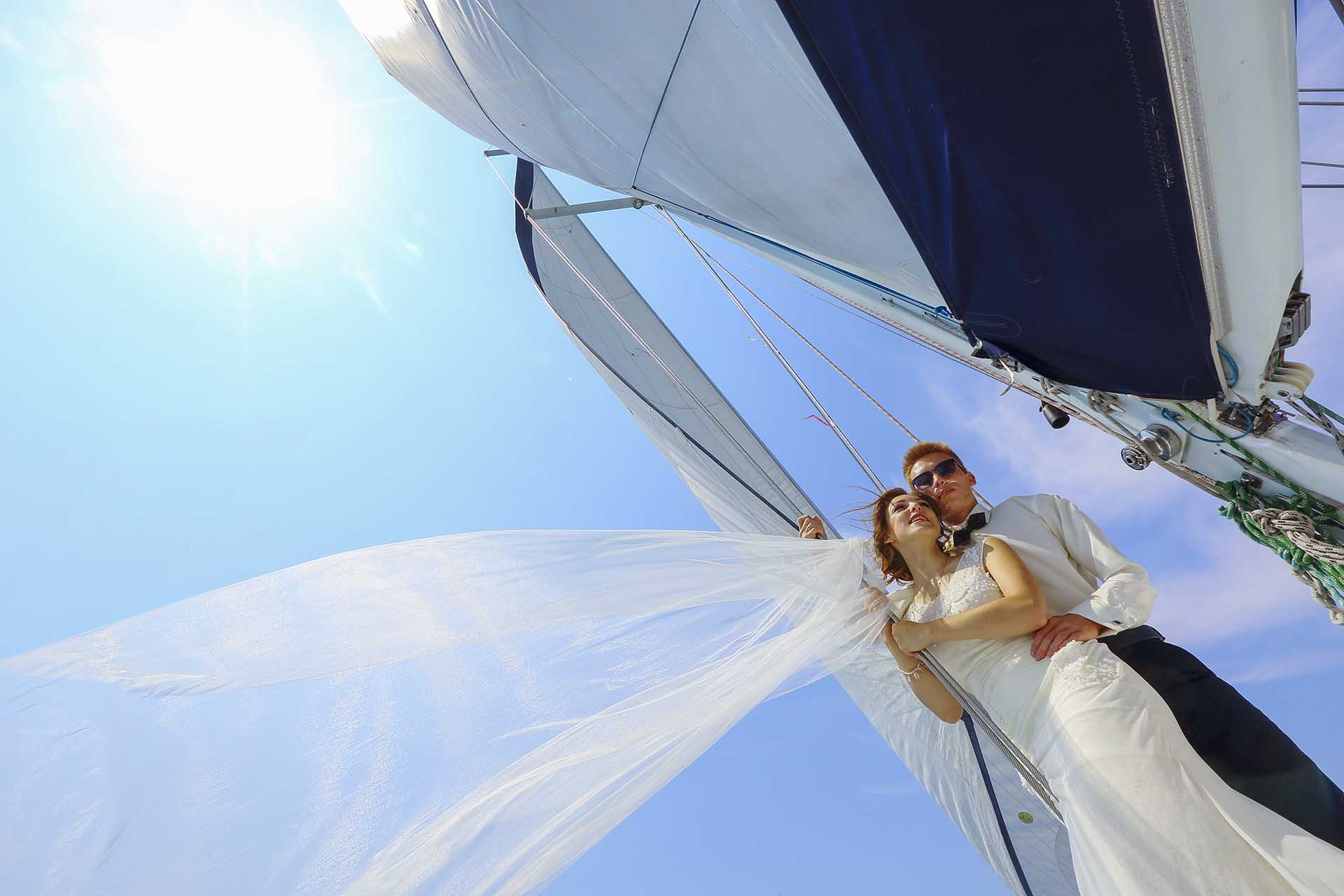 beautiful couple - bride and groom - a trip on a Catamaran in Cancun
