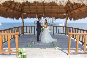 getting married on a dock in cancun