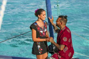 Young couple just married on a boat at cancun boat. Company Experiencias Cancun